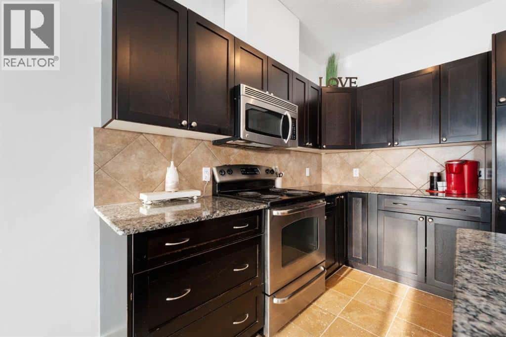 602, 620 Luxstone Landing SW — Airdrie, Alberta - Photo 5 of 36