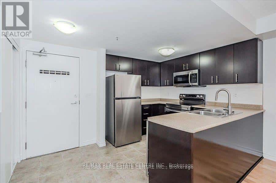 202 - 41 GOODWIN DRIVE — Guelph (Pineridge/Westminster Woods), Ontario - Photo 2 of 35