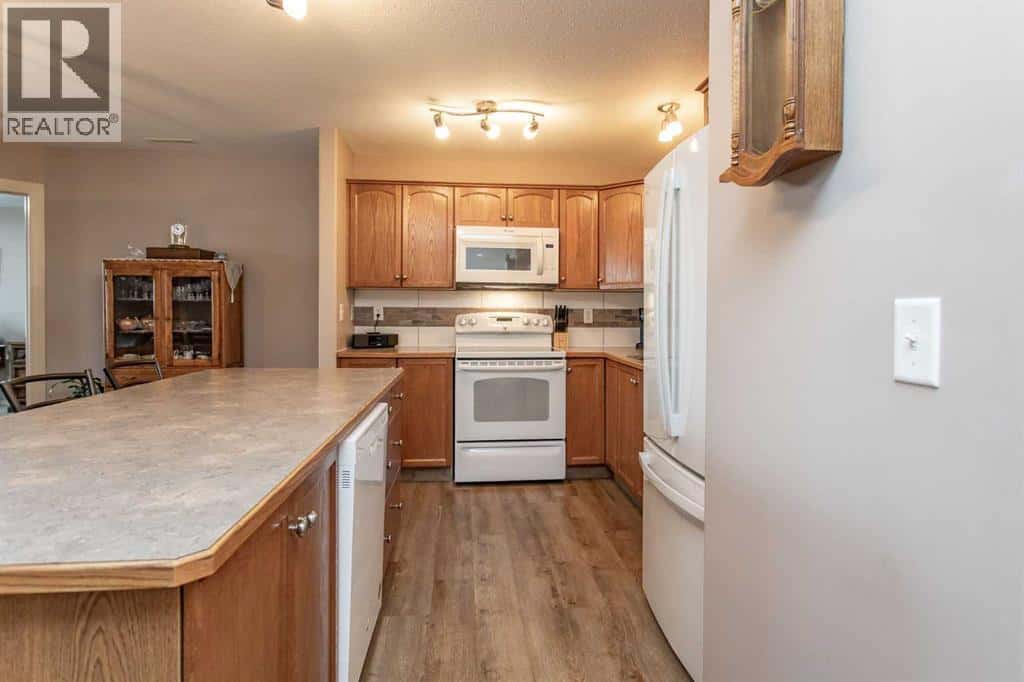 202, 4425 HERITAGE Way — Lacombe, Alberta - Photo 5 of 21