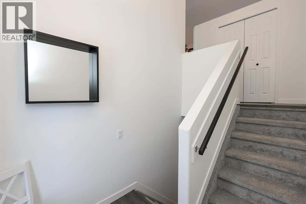 65 Leung Place — Blackfalds, Alberta - Photo 3 of 42