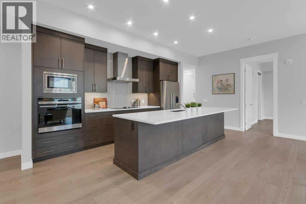 302, 235 Lebel Crescent NW — Calgary, Alberta - Photo 3 of 34