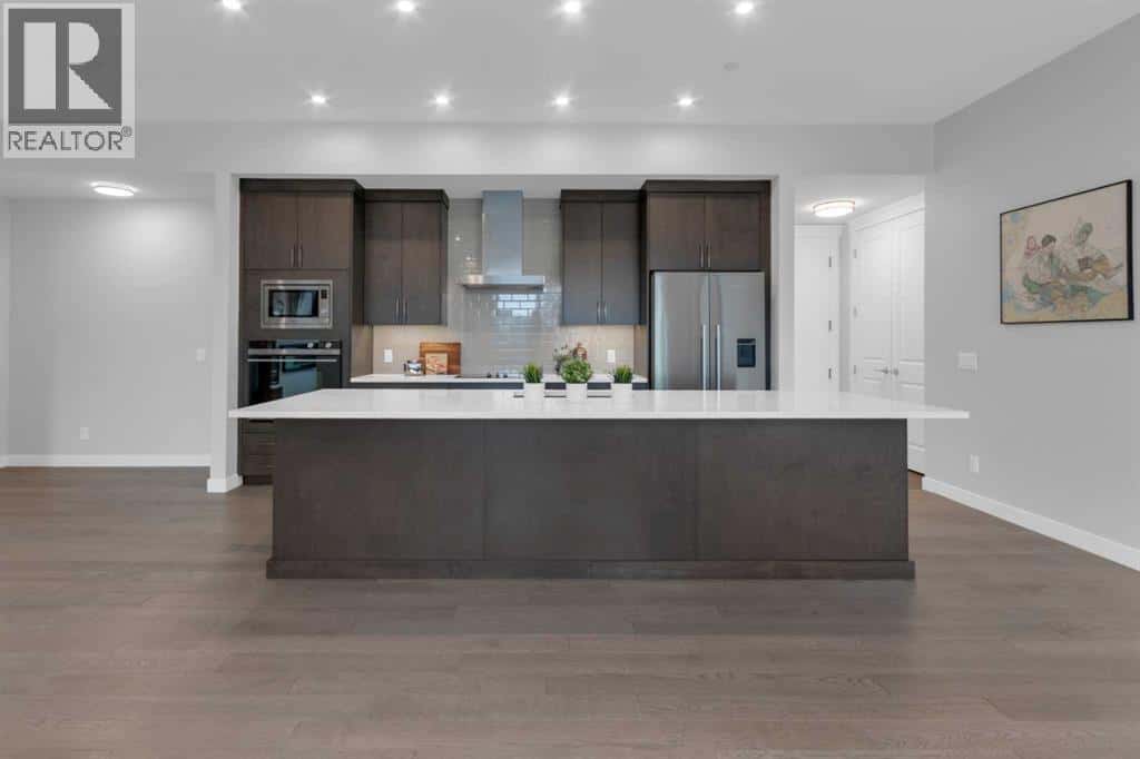 302, 235 Lebel Crescent NW — Calgary, Alberta - Photo 4 of 34