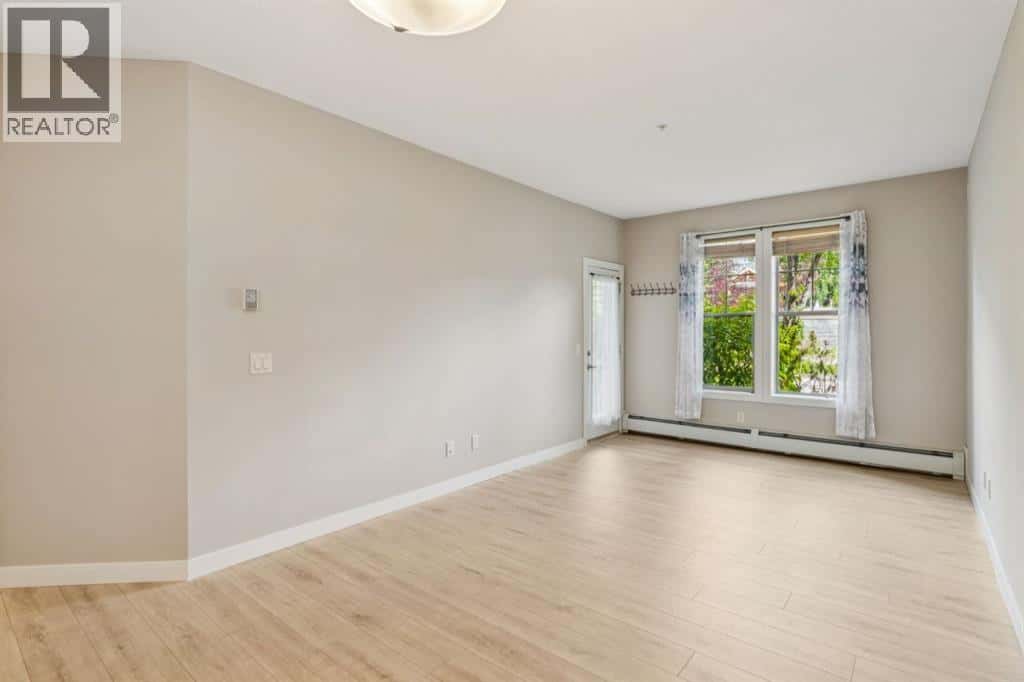 110, 205 Sunset Drive — Cochrane, Alberta - Photo 5 of 23