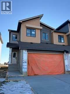 516 Heritage Boulevard — Cochrane, Alberta - Main photo