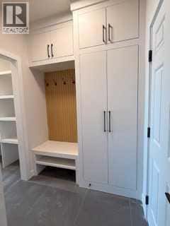 516 Heritage Boulevard — Cochrane, Alberta - Photo 3 of 31