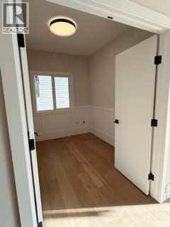 516 Heritage Boulevard — Cochrane, Alberta - Photo 5 of 31