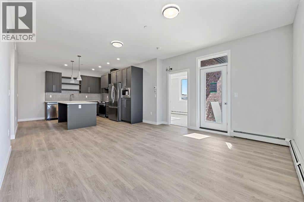 1115, 520 Reynolds Avenue SW — Airdrie, Alberta - Photo 2 of 15