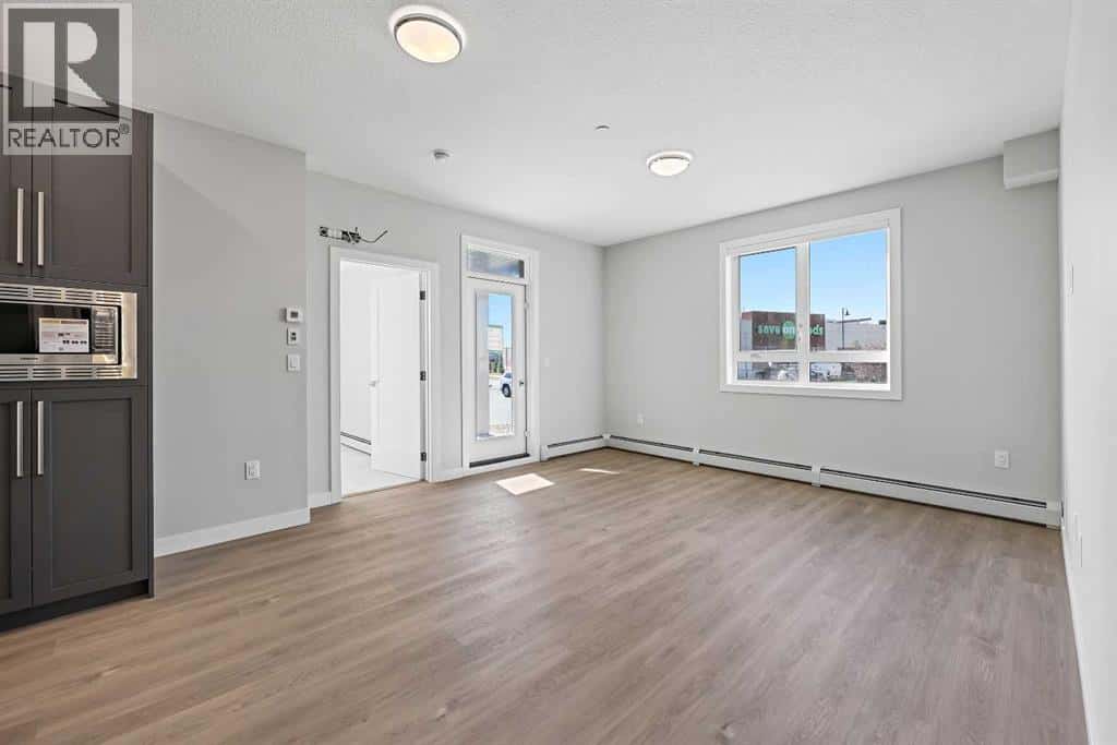 1115, 520 Reynolds Avenue SW — Airdrie, Alberta - Photo 3 of 15