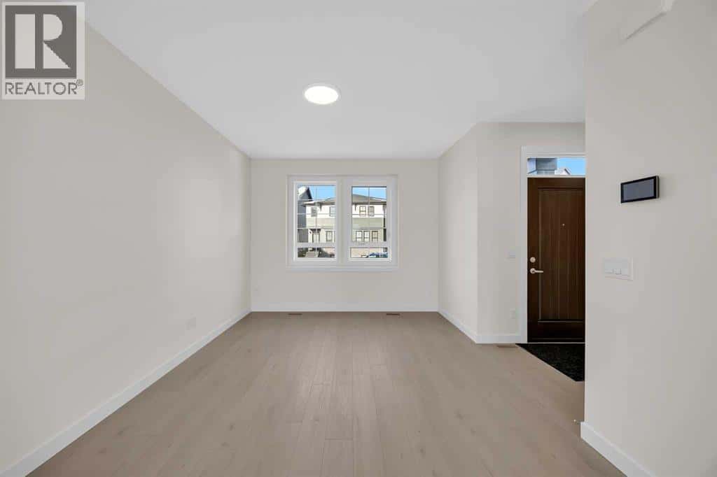 143 Ricardo Ranch Avenue SE — Calgary, Alberta - Photo 4 of 32