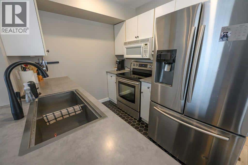 7204 105 Street — Grande Prairie, Alberta - Photo 5 of 24