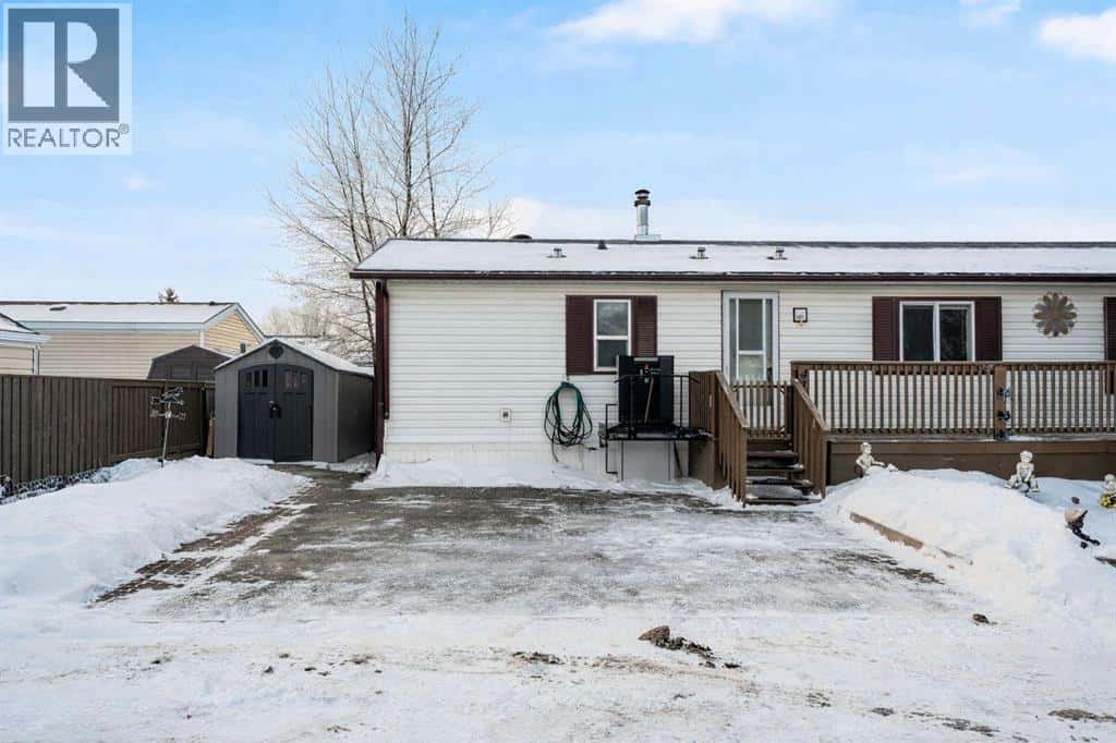 413 Heritage Crescent — Okotoks, Alberta - Photo 2 of 32