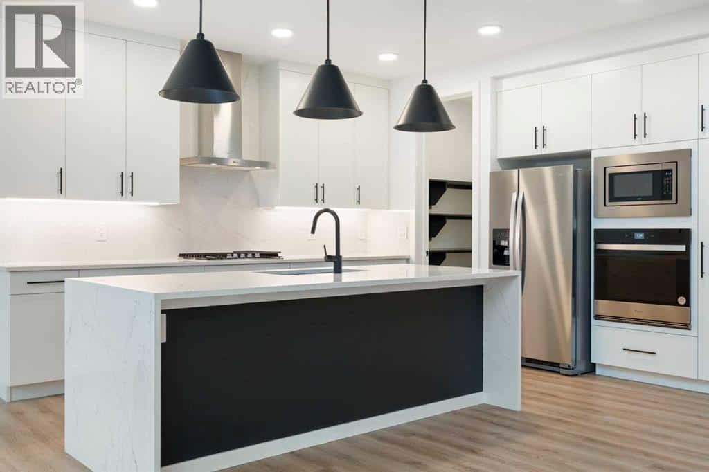 296 Spring Creek Circle SW — Calgary, Alberta - Photo 5 of 38