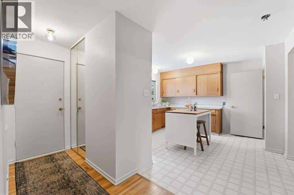 67 Woodlark Drive SW — Calgary, Alberta - Photo 3 of 39