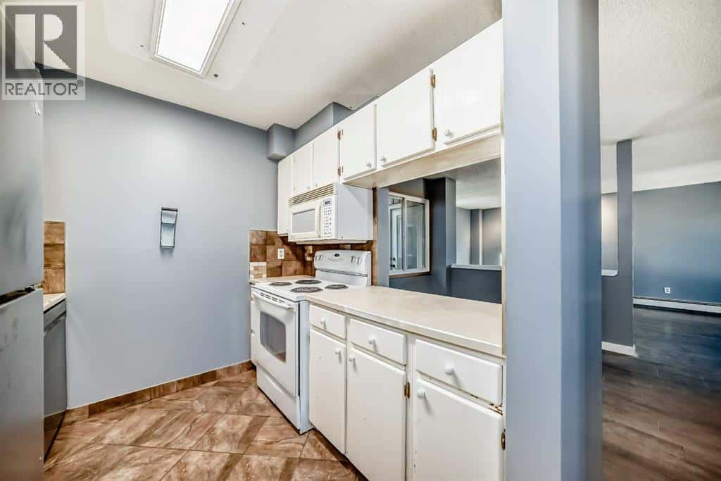 324, 860 Midridge Drive SE — Calgary, Alberta - Photo 3 of 25