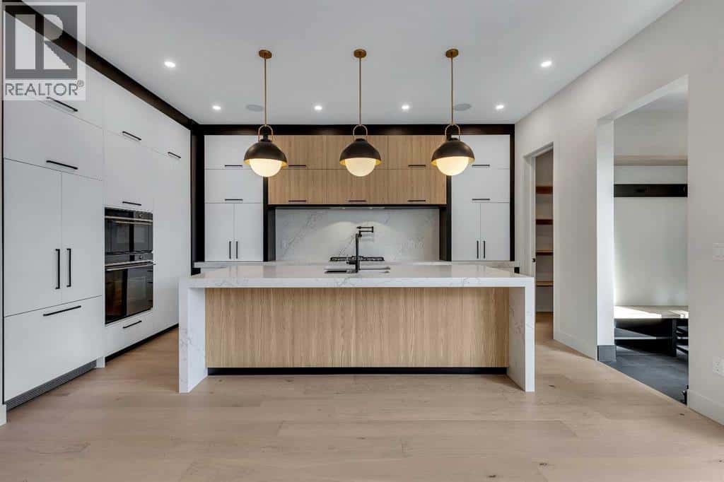 342 Normandy Drive SW — Calgary, Alberta - Photo 3 of 48