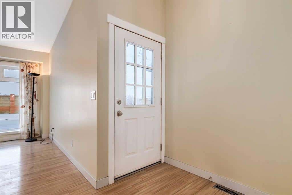 176 Riverbirch Road SE — Calgary, Alberta - Photo 3 of 25