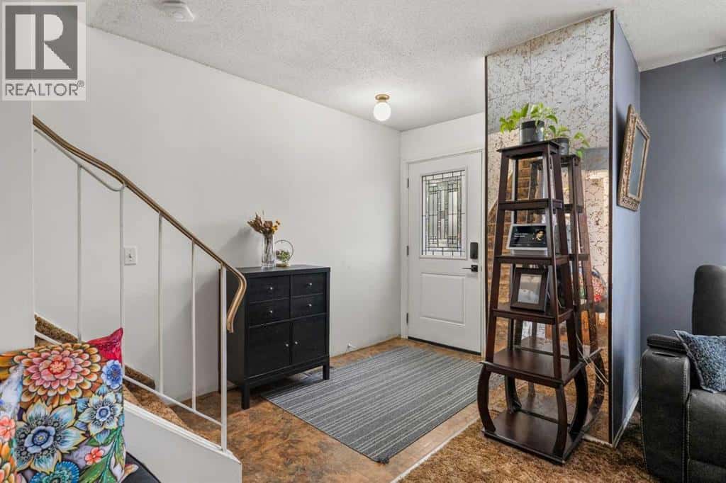 48 Marbank Place NE — Calgary, Alberta - Photo 5 of 50