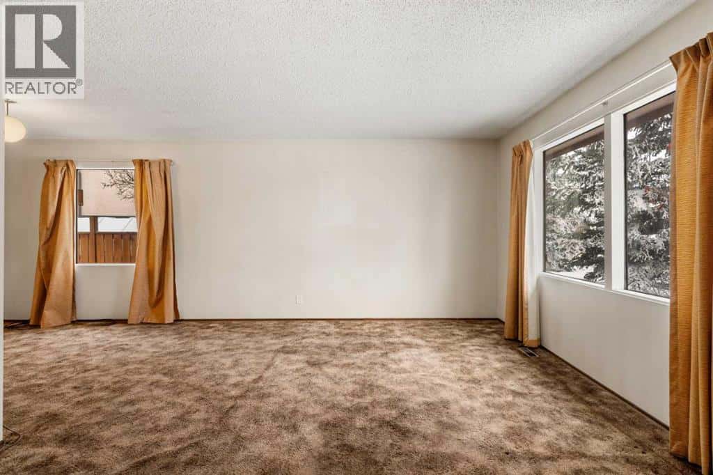 1151 Marcombe Crescent NE — Calgary, Alberta - Photo 5 of 43