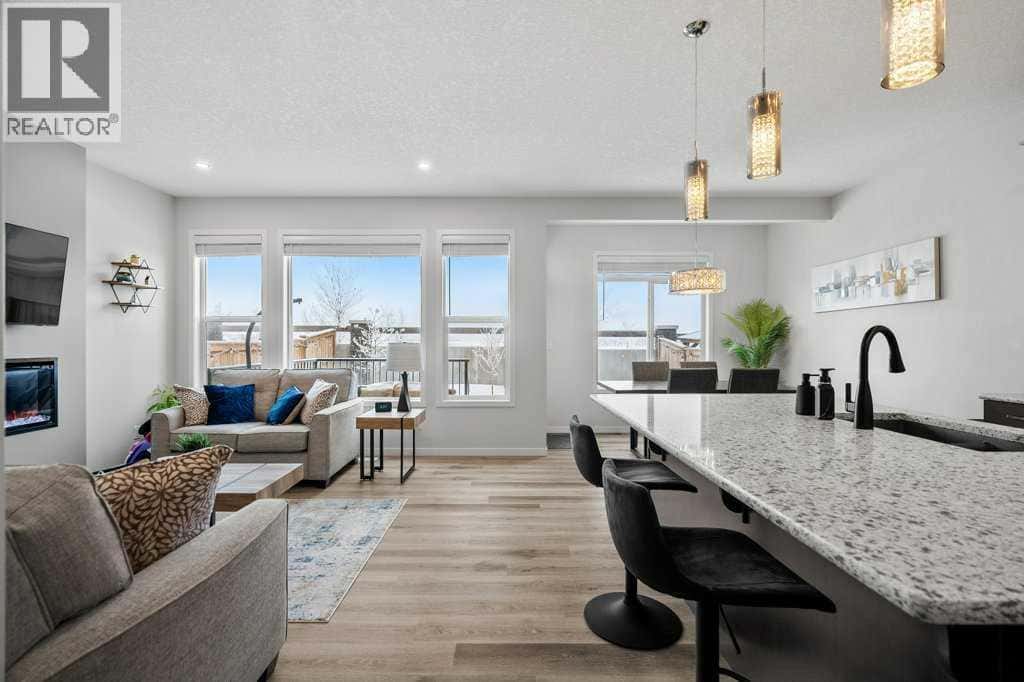 102 Creekside Way SW — Calgary, Alberta - Photo 3 of 50