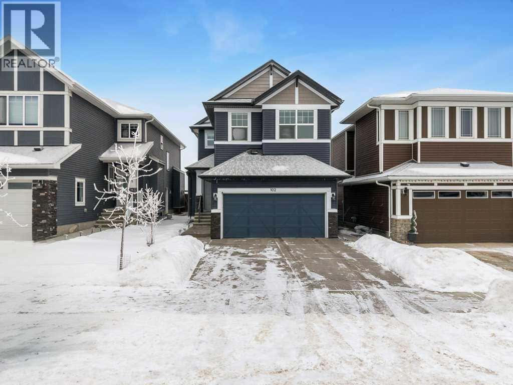 102 Creekside Way SW — Calgary, Alberta - Photo 2 of 50