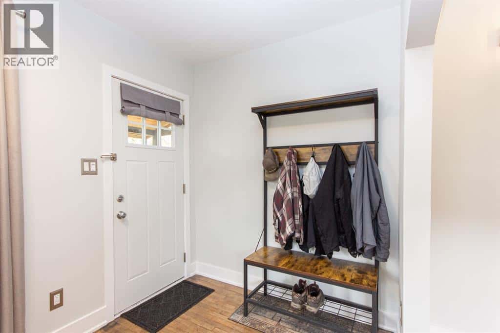 5919 52 Avenue — Red Deer, Alberta - Photo 3 of 44