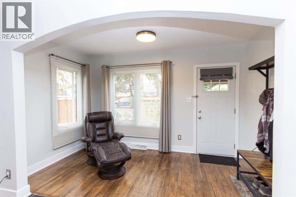 5919 52 Avenue — Red Deer, Alberta - Photo 4 of 44