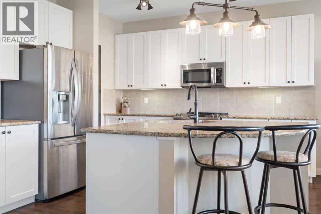 47 Copperstone Mews SE — Calgary, Alberta - Photo 3 of 50