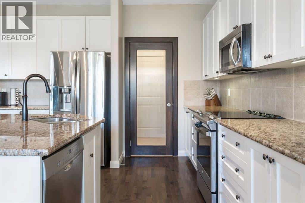 47 Copperstone Mews SE — Calgary, Alberta - Photo 4 of 50