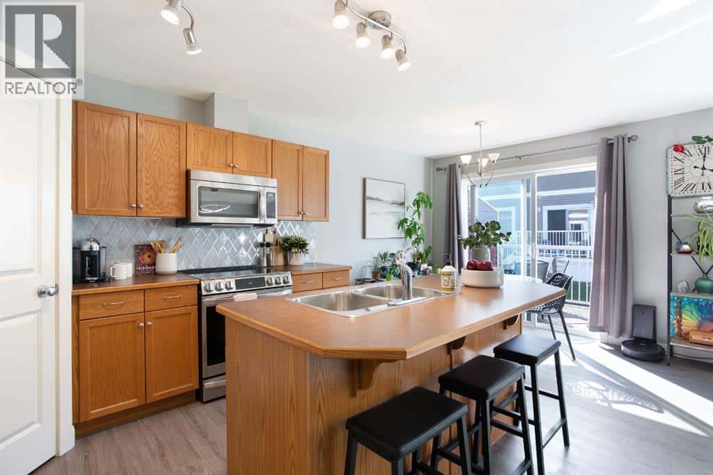 1405, 800 Yankee Valley Boulevard SE — Airdrie, Alberta - Photo 3 of 31