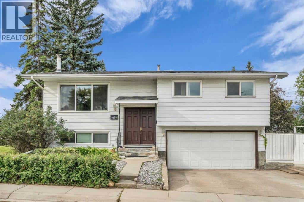 403 Queen Alexandra Way SE — Calgary, Alberta - Photo 3 of 44