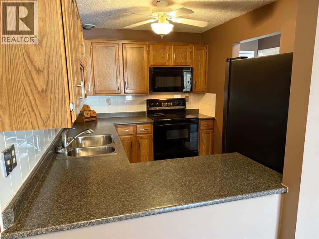 203, 234 5 Avenue NE — Calgary, Alberta - Photo 3 of 19