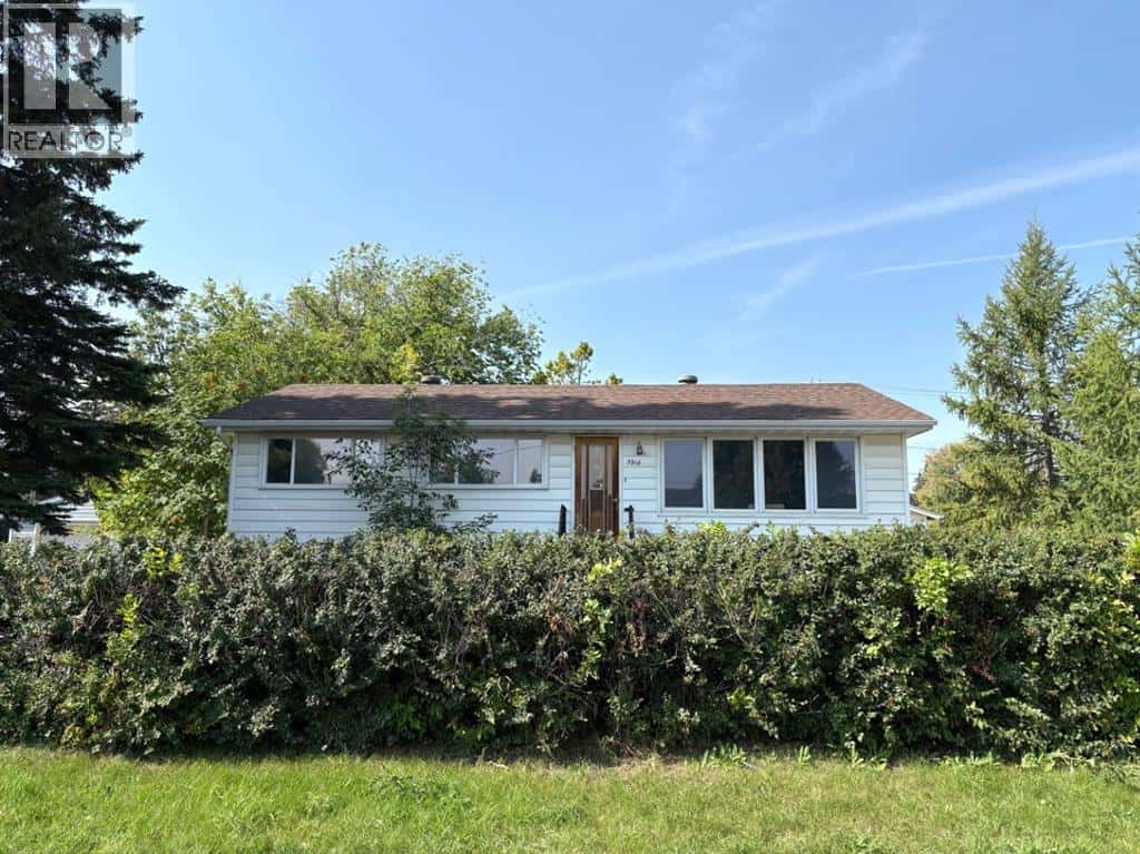 3918 56 Avenue — Red Deer, Alberta - Photo 3 of 29