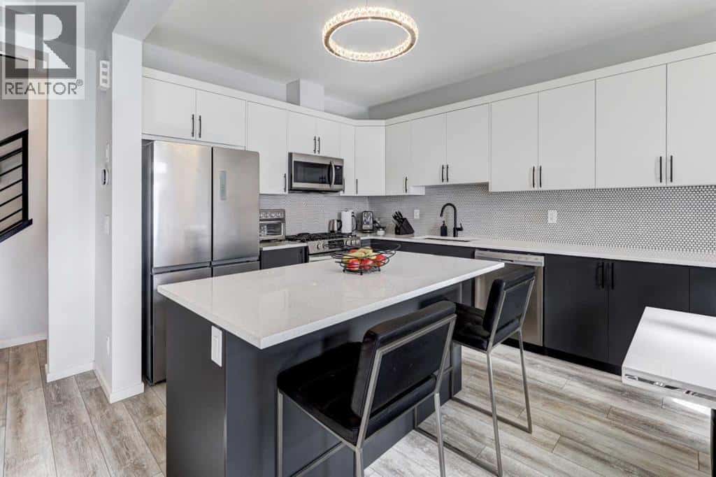 785 Windrow Manor SW — Airdrie, Alberta - Photo 4 of 31