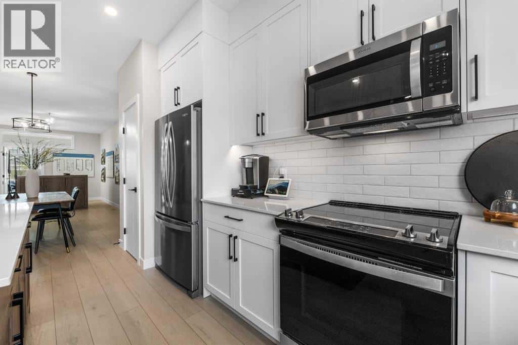 84 Ricardo Ranch Avenue SE — Calgary, Alberta - Photo 2 of 39