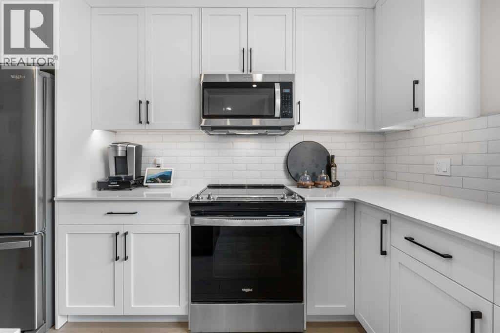 84 Ricardo Ranch Avenue SE — Calgary, Alberta - Photo 3 of 39