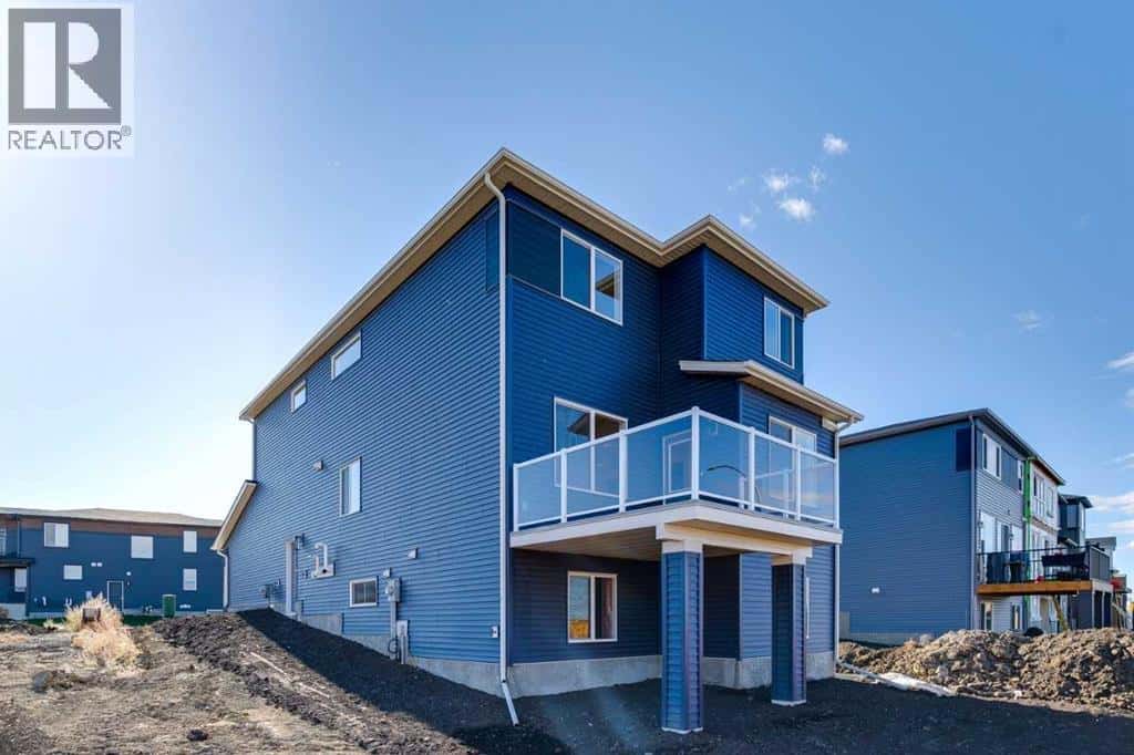 140 Belmont Place SW — Calgary, Alberta - Photo 4 of 9