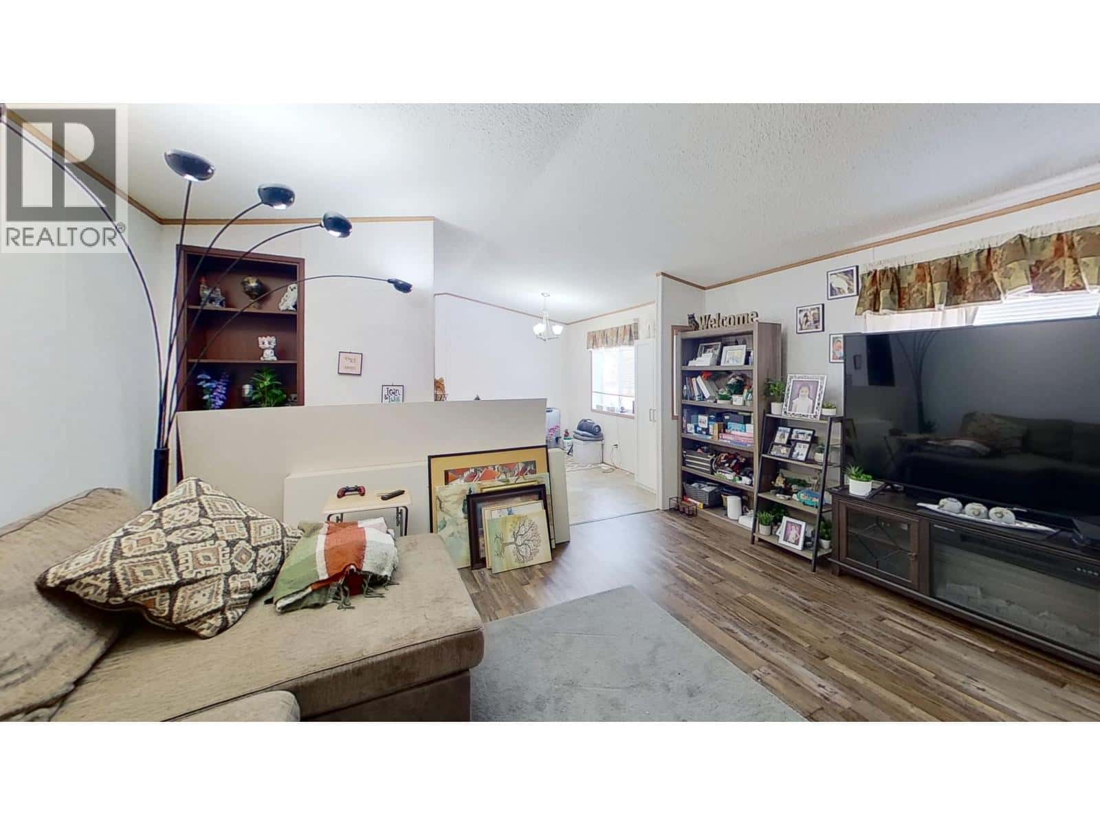 8125 85A AVENUE — Fort St. John, British Columbia - Photo 4 of 23