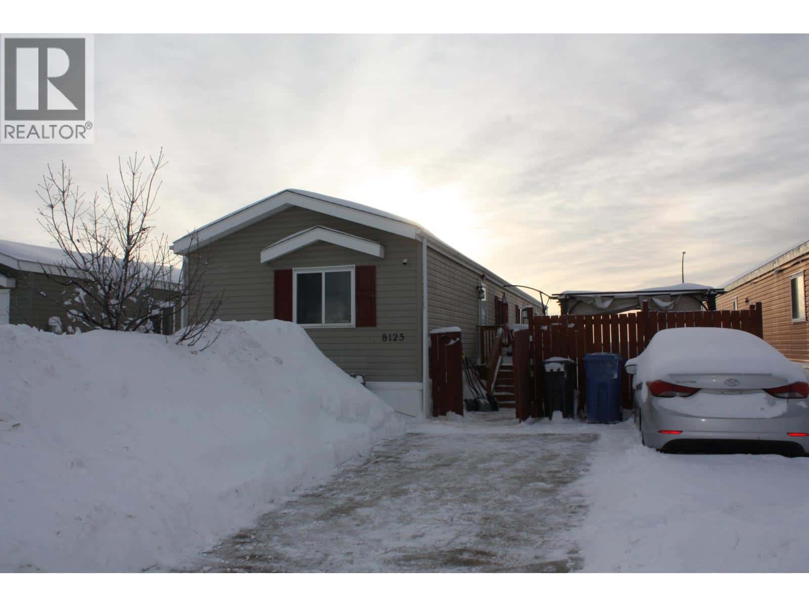 8125 85A AVENUE — Fort St. John, British Columbia - Photo 3 of 23