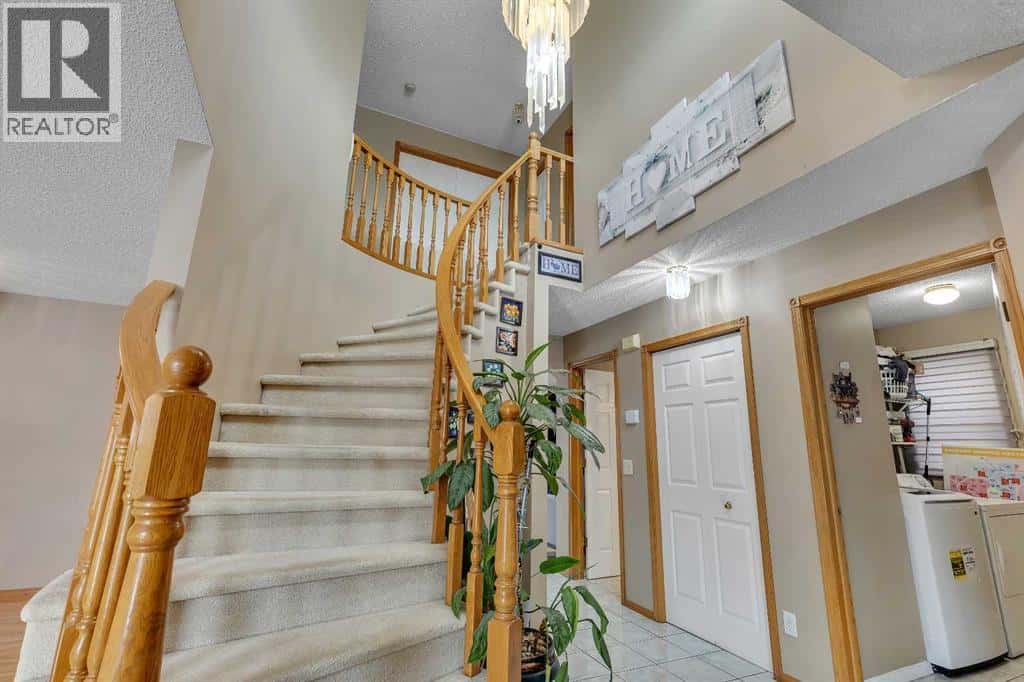 710 Coral Springs Boulevard NE — Calgary, Alberta - Photo 5 of 49