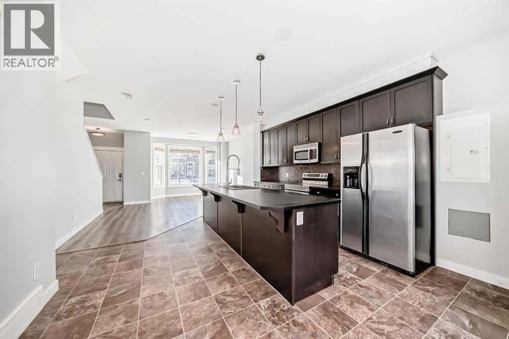 397 Rainbow Falls Drive — Chestermere, Alberta - Photo 4 of 36