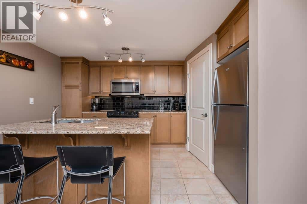 1005, 910 5 Avenue SW — Calgary, Alberta - Photo 4 of 30