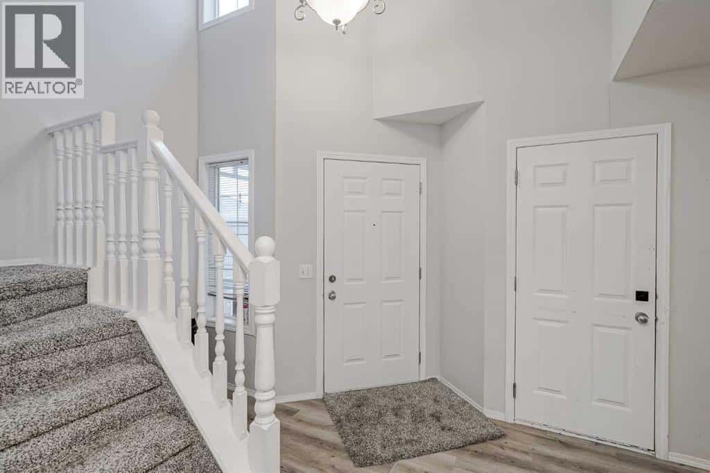 222 Bridleridge Way SW — Calgary, Alberta - Photo 2 of 32