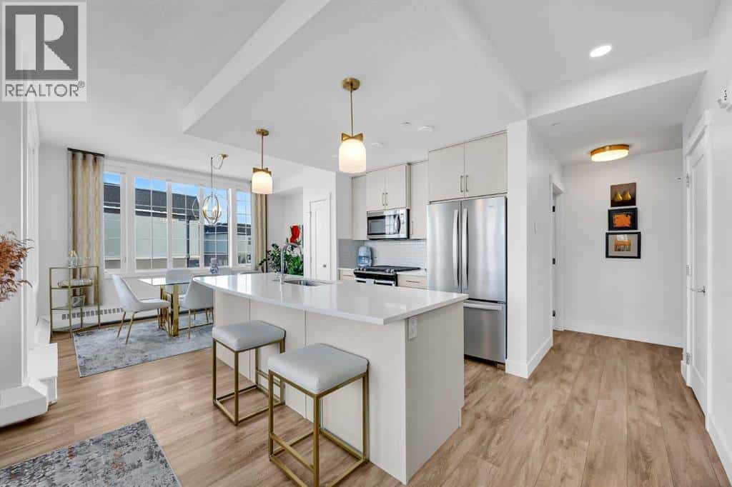 210, 38 Quarry Gate SE — Calgary, Alberta - Photo 2 of 34