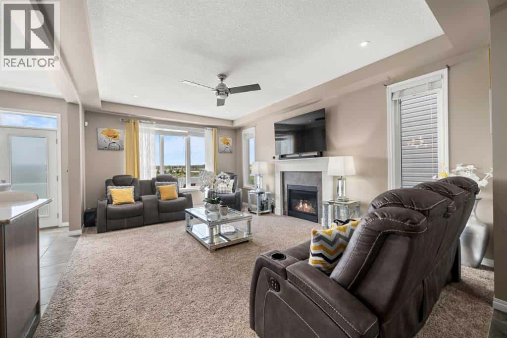 353 Windrow Crescent SW — Airdrie, Alberta - Photo 4 of 34