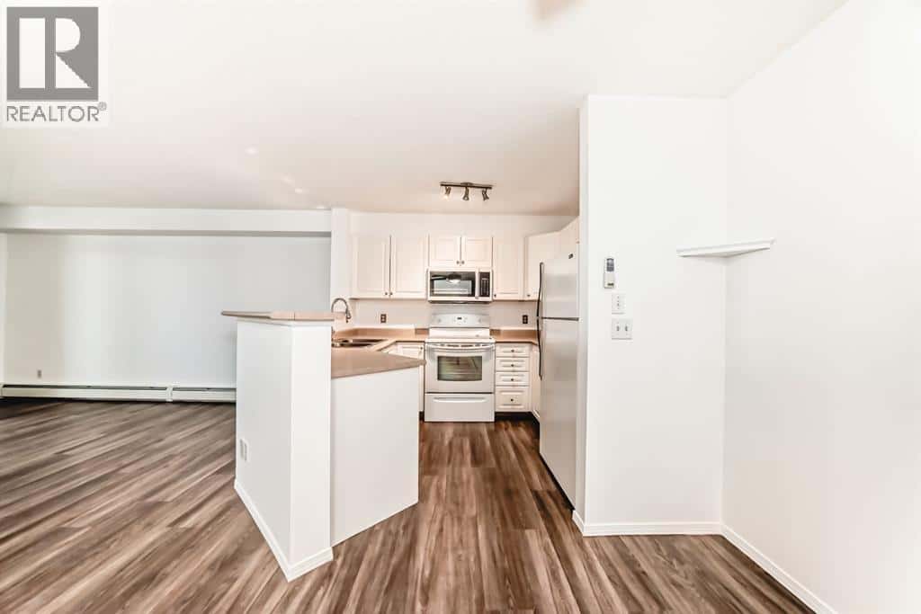 5407, 604 8 Street SW — Airdrie, Alberta - Photo 4 of 38