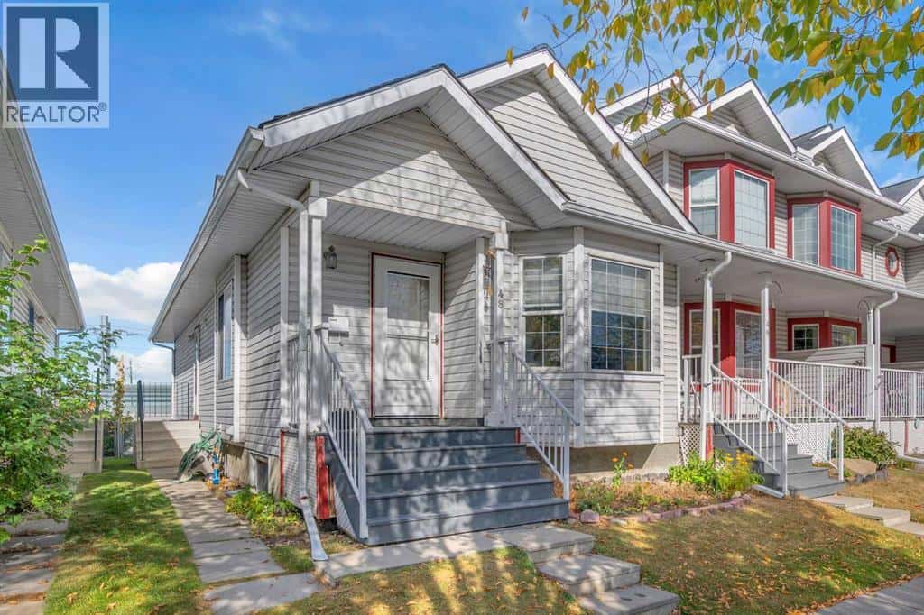 48 Martin Crossing Court NE — Calgary, Alberta - Photo 3 of 33