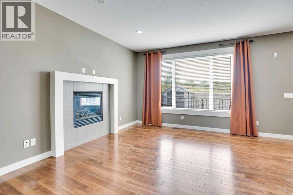 157 Rainbow Falls Boulevard — Chestermere, Alberta - Photo 5 of 44