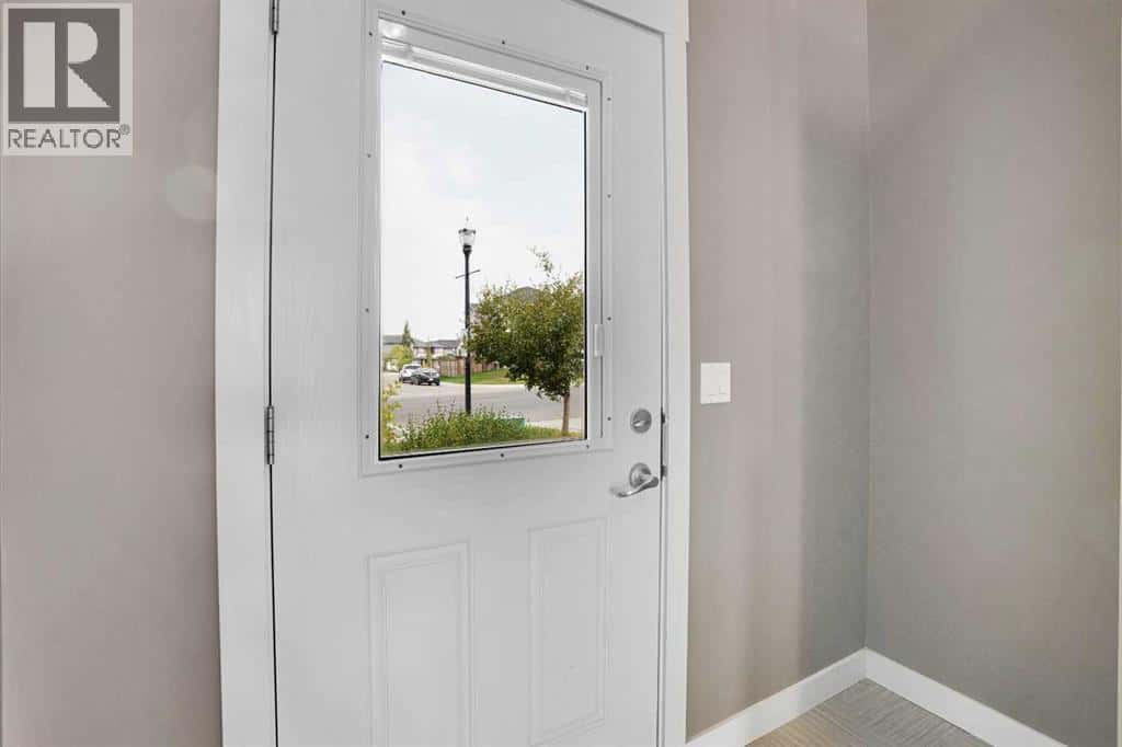 157 Rainbow Falls Boulevard — Chestermere, Alberta - Photo 3 of 44