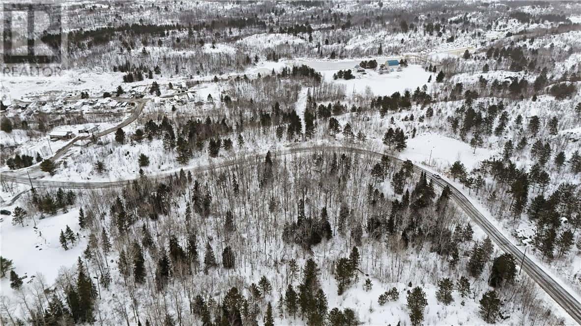 411 Dryden Road — Wahnapitae, Ontario - Photo 2 of 6