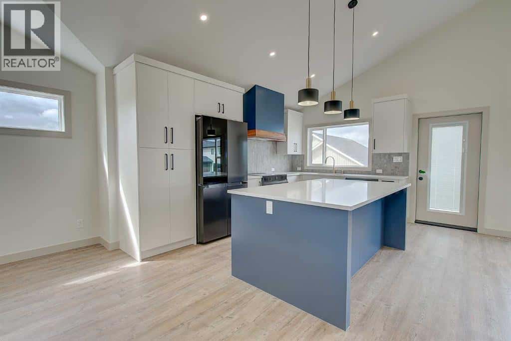 18 Trout Avenue — Red Deer, Alberta - Photo 4 of 36